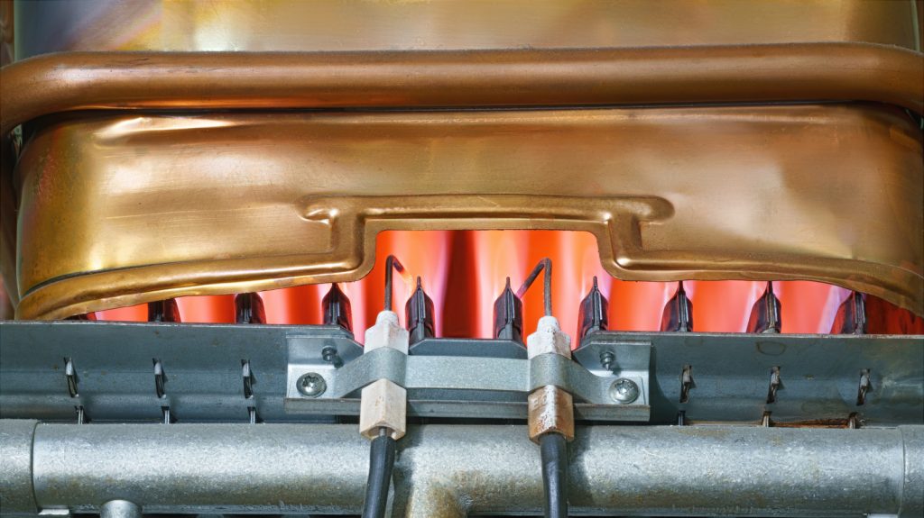Why Your Gas Water Heater Flame Is Yellow or Orange (And How to Fix It)
